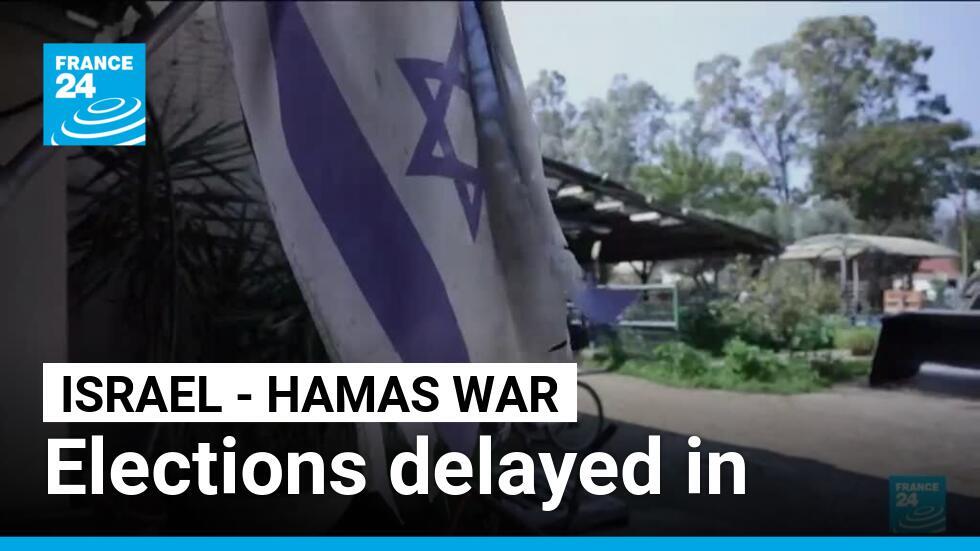An Israeli flag hangs from a home in the northern Israeli kibbutz of Amir. 